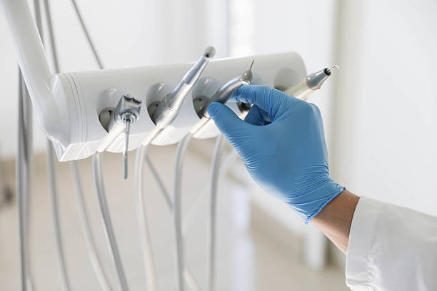 Professional Tooth Extraction technician working in Greenville, RI